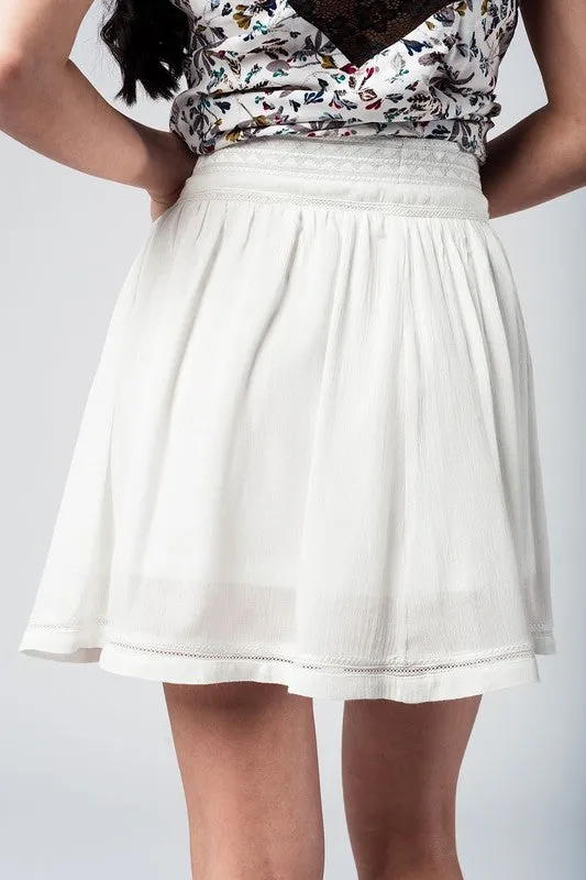 White mini skirt